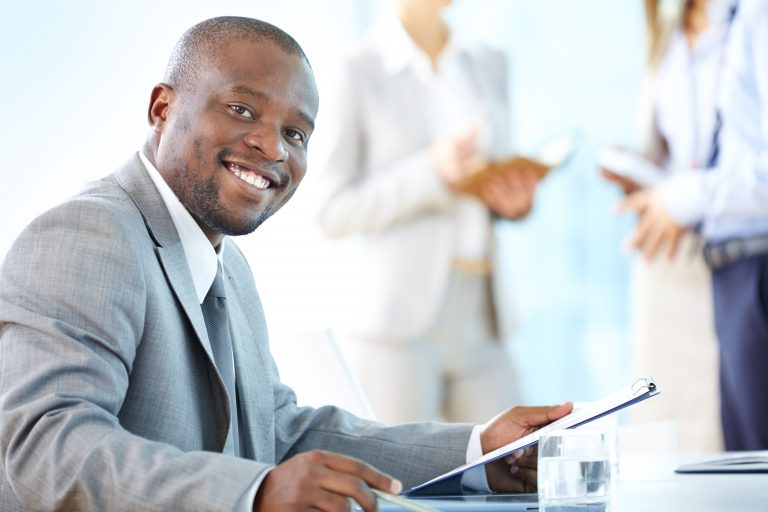 executive-reviewing-notes-min